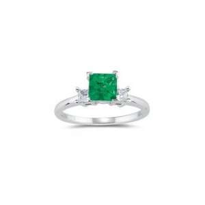  0.20 Cts Diamond & 0.53 Cts Emerald Classic Three Stone 