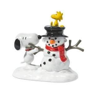    Peanuts   Village   Snoopy Builds A Snowman