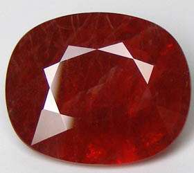   14.75 CTs. GOLDEN RED NATURAL RUBY FROM SONGEA / TANZANIA.  
