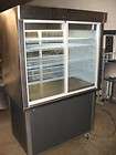Delfield F5PC48D 48 Pass Thru Refrigerated Display Case Mounted on 