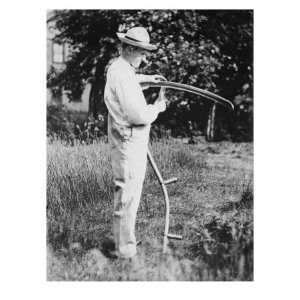  President Calvin Coolidge Sharpening a Scythe on His Farm 