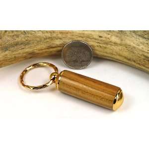  Limba Pill Case With a Gold Finish