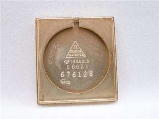   has raised gold hour markers, and an applied Omega symbol. View photos