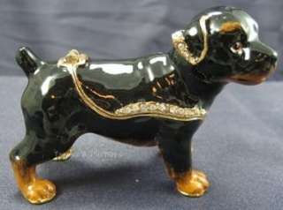 black and brown rottweiler puppy dog is a beautiful hinged trinket box 