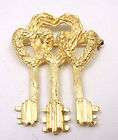 cartier 18k gold triple key pin brooch we buy fine