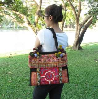 This bag is made with a vintage Hmong baby carrier and cotton fabric