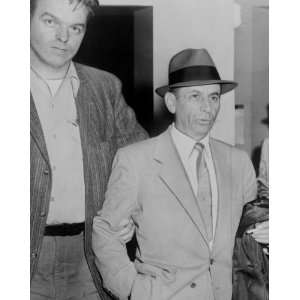  1958 photo Meyer Lansky, being led by detective for 
