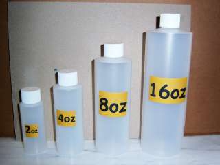 LOT OF 60 2oz PLASTIC BOTTLES W/WHITE RIBBED CAPS  
